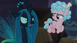 Size: 1920x1080 | Tagged: safe, screencap, cozy glow, queen chrysalis, changeling, changeling queen, pegasus, pony, g4, the summer sun setback, barrel, cozy glow is not amused, duo, female, filly, flying, foal, queen chrysalis is not amused, unamused