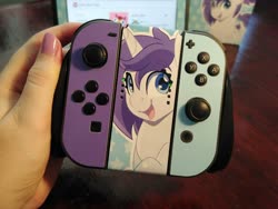 Size: 2048x1536 | Tagged: safe, artist:partypievt, oc, oc only, oc:indigo wire, pony, unicorn, irl, looking at you, nintendo, nintendo switch, photo, solo, wingding eyes