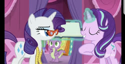 Size: 828x424 | Tagged: safe, screencap, rarity, spike, starlight glimmer, dragon, pony, unicorn, a-dressing memories, g4, spoiler:a-dressing memories, spoiler:mlp friendship is forever, 9now, book, eyes closed, female, glasses, levitation, magic, male, mare, measuring tape, nine network, rarity's glasses, telekinesis, unamused