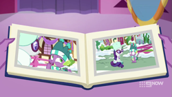 Size: 711x400 | Tagged: safe, screencap, rarity, spike, a-dressing memories, g4, my little pony best gift ever, my little pony: friendship is forever, book, winter clothes