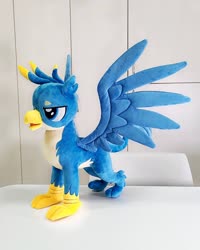 Size: 1440x1800 | Tagged: safe, artist:nekokevin, gallus, griffon, g4, irl, lidded eyes, male, open mouth, photo, plushie, smiling, solo, spread wings, talons, teenager, wings