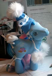 Size: 533x768 | Tagged: safe, photographer:lilcricketnoise, marshmellow coco (g3), g3, bow, hat, irl, photo, tail bow, toy, winter hat, winter ponies