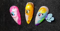 Size: 1080x565 | Tagged: safe, artist:plop.nailsart, applejack, pinkie pie, rainbow dash, earth pony, pegasus, pony, g4, female, hat, irl, mare, nails, photo, wings