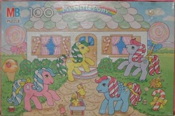 Size: 616x410 | Tagged: safe, photographer:wickedwonderland, caramel crunch, lemon treats, mint dreams, molasses, bird, duck, g1, official, bow, candy, candy cane, candy cane pony, food, gingerbread man, house, ice cream, ice cream cone, irl, lollipop, merchandise, milton bradley, photo, puzzle, tail bow