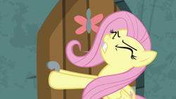 Size: 1920x1080 | Tagged: safe, screencap, angel bunny, fluttershy, pegasus, pony, g4, she talks to angel, body swap, eyes closed, female, gritted teeth, having trouble, mare, pulling, solo, straining, struggling