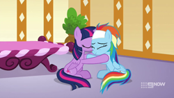 Size: 1280x720 | Tagged: safe, screencap, rainbow dash, twilight sparkle, alicorn, pegasus, deep tissue memories, spoiler:deep tissue memories, spoiler:mlp friendship is forever, 9now, comforting, duo, eyes closed, hug, massage table, ponyville spa, sitting, smiling, spa pony rainbow dash, twilight sparkle (alicorn), wings
