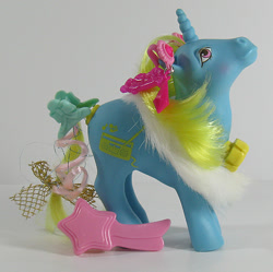 Size: 602x600 | Tagged: safe, photographer:breyer600, d.j. (g1), g1, barrette, bow, brush, dance 'n prance pony, ear piercing, earring, feather boa, irl, jewelry, photo, piercing, tail bow, toy