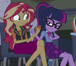 Size: 600x522 | Tagged: safe, screencap, sci-twi, sunset shimmer, twilight sparkle, cheer you on, equestria girls, g4, my little pony equestria girls: better together, cellphone, cropped, female, geode of empathy, geode of telekinesis, glasses, magical geodes, phone, smartphone