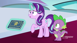 Size: 1280x720 | Tagged: safe, screencap, spike, starlight glimmer, dragon, pony, unicorn, g4, memories and more, spoiler:memories and more, spoiler:mlp friendship is forever, 9now, book, crossed arms, levitation, magic, magic aura, scrapbook, telekinesis, throne room, winged spike, wings