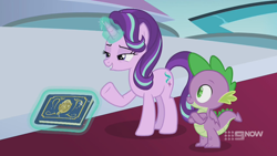 Size: 1280x720 | Tagged: safe, screencap, spike, starlight glimmer, dragon, pony, unicorn, g4, memories and more, my little pony: friendship is forever, 9now, book, crossed arms, duo, levitation, magic, magic aura, scrapbook, telekinesis, winged spike, wings