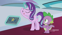 Size: 1280x720 | Tagged: safe, screencap, spike, starlight glimmer, dragon, pony, unicorn, g4, memories and more, my little pony: friendship is forever, 9now, book, crossed arms, duo, eyes closed, levitation, magic, magic aura, scrapbook, telekinesis, winged spike, wings