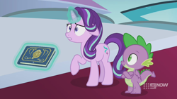 Size: 1280x720 | Tagged: safe, screencap, spike, starlight glimmer, dragon, pony, unicorn, g4, memories and more, my little pony: friendship is forever, 9now, book, crossed arms, duo, levitation, magic, magic aura, scrapbook, shrunken pupils, telekinesis, winged spike, wings, worried