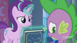 Size: 1280x720 | Tagged: safe, screencap, spike, starlight glimmer, dragon, pony, unicorn, g4, memories and more, spoiler:memories and more, spoiler:mlp friendship is forever, 9now, book, duo, levitation, magic, magic aura, scrapbook, telekinesis, unamused, winged spike, wings, worried