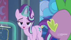 Size: 1280x720 | Tagged: safe, screencap, spike, starlight glimmer, dragon, pony, unicorn, g4, memories and more, my little pony: friendship is forever, 9now, bedroom eyes, book, duo, levitation, looking at you, magic, magic aura, mid-blink screencap, scrapbook, telekinesis, winged spike, wings