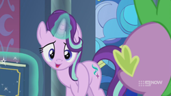 Size: 1280x720 | Tagged: safe, screencap, spike, starlight glimmer, dragon, pony, unicorn, g4, memories and more, spoiler:memories and more, spoiler:mlp friendship is forever, 9now, book, duo, levitation, looking at you, magic, magic aura, scrapbook, telekinesis, winged spike, wings