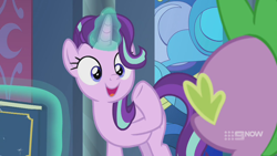 Size: 1280x720 | Tagged: safe, screencap, spike, starlight glimmer, dragon, pony, unicorn, g4, memories and more, my little pony: friendship is forever, 9now, book, duo, levitation, looking at each other, magic, magic aura, scrapbook, smiling, telekinesis, winged spike, wings
