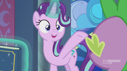 Size: 1280x720 | Tagged: safe, screencap, spike, starlight glimmer, dragon, pony, unicorn, g4, memories and more, spoiler:memories and more, spoiler:mlp friendship is forever, 9now, book, duo, levitation, looking at each other, magic, magic aura, scrapbook, smiling, telekinesis, winged spike, wings