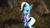 Size: 3840x2160 | Tagged: safe, artist:psfmer, trixie, pony, unicorn, g4, 3d, babysitter trixie, clothes, female, gem, grass, ground, high res, hoodie, looking at you, looking up at you, mare, raised hoof, raspberry, revamped ponies, rock, sitting, solo, source filmmaker, tongue out, tree