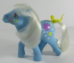 Size: 704x600 | Tagged: safe, photographer:breyer600, night glider (g1), g1, bow, irl, photo, simple background, tail bow, toy, twice as fancy ponies