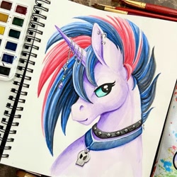 Size: 960x960 | Tagged: safe, artist:dragonsandbeasties, oc, oc only, pony, unicorn, charm, collar, green eyes, photo, piercing, skull, solo, spikey mane, styled hair, traditional art, watercolor painting