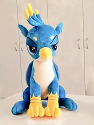 Size: 768x1024 | Tagged: safe, artist:nekokevin, gallus, griffon, g4, irl, lidded eyes, looking at you, male, photo, plushie, sitting, solo, teenager