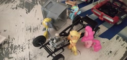 Size: 3264x1546 | Tagged: artist needed, source needed, safe, applejack, derpy hooves, pinkie pie, rainbow dash, g4, cart, chassis, engine, everfree customs, figurine, garage, i just don't know what went wrong, mechanic, oops, photo, pontiac gto, v8