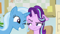 Size: 1920x1080 | Tagged: safe, screencap, starlight glimmer, trixie, pony, unicorn, a horse shoe-in, g4, season 9, annoyed, duo, duo female, excited, female, floppy ears, frown, glare, grin, hair flip, looking at each other, mare, narrowed eyes, raised eyebrow, smiling, starlight glimmer is not amused, starlight's office, unamused, wink
