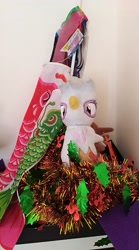 Size: 2240x4032 | Tagged: safe, photographer:horsesplease, gilda, griffon, g4, female, flag, irl, malaysia, photo, plushie, shrine, tinsel