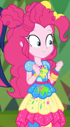 Size: 491x889 | Tagged: safe, screencap, pinkie pie, equestria girls, equestria girls specials, g4, my little pony equestria girls: better together, my little pony equestria girls: sunset's backstage pass, beads, canvas, clothes, cropped, curly hair, cute, diapinkes, dress, female, forest background, geode of sugar bombs, gold, grass, hairband, happy, jewelry, magical geodes, music festival outfit, outdoors, paint, pants, short sleeves, smiling, wristband