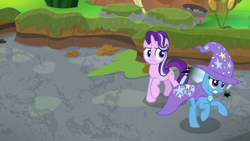 Size: 1920x1080 | Tagged: safe, screencap, starlight glimmer, trixie, pony, unicorn, a horse shoe-in, g4, burnt mane, cape, clothes, duo, female, galloping, hat, mare, scorched, trixie's cape, trixie's hat