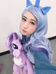 Size: 1202x1600 | Tagged: safe, artist:bunnyoxo, starlight glimmer, trixie, human, g4, cape, clothes, convention:japanponycon, cosplay, costume, crown, horn, irl, irl human, jewelry, photo, plushie, pony ears, ponyfesta, regalia, trixie's cape