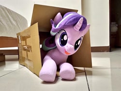 Size: 1024x768 | Tagged: safe, artist:nekokevin, starlight glimmer, pony, unicorn, series:nekokevin's glimmy, g4, box, female, irl, lying down, mare, open mouth, photo, plushie, pony in a box, smiling, solo, underhoof