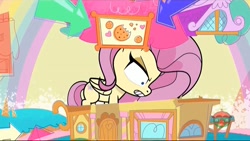 Size: 1280x720 | Tagged: safe, screencap, fluttershy, pegasus, pony, death of a sales-pony, g4.5, my little pony: pony life, angry, female, giant pony, giantess, giantshy, macro, mare, rooftop, shrunken pupils, solo, sugarcube corner