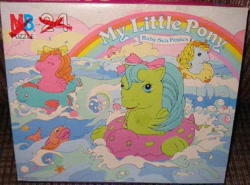 Size: 569x422 | Tagged: safe, photographer:tradertif, backstroke, sun shower, tiny bubbles, sea pony, g1, official, baby sea ponies, hair bow, merchandise, milton bradley, ocean, puzzle