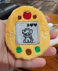 Size: 1683x2048 | Tagged: safe, artist:sew_adorkable, artist:trashkitten-plushies, applejack, pony, g4, buttons, embroidery, irl, photo, plushie, solo, tamagotchi