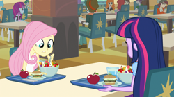 Size: 1904x1064 | Tagged: safe, screencap, fluttershy, twilight sparkle, equestria girls, g4, my little pony equestria girls, apple, bowl, burger, cafeteria, canterlot high, chair, female, food, fruit, glass, hamburger, plate, spoon, table