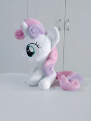 Size: 768x1024 | Tagged: safe, artist:nekokevin, sweetie belle, pony, unicorn, g4, cute, diasweetes, female, filly, irl, photo, plushie, sitting, smiling, solo