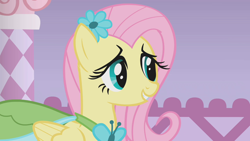 Size: 1280x720 | Tagged: safe, screencap, fluttershy, pony, g4, season 1, suited for success, clothes, dress, female, flower, flower in hair, gala dress, mare, solo