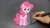 Size: 1280x720 | Tagged: safe, artist:tigertomato, pinkie pie, earth pony, human, pony, g4, black background, cute, diapinkes, female, food, hand, irl, irl human, it came from youtube, pancake art, pancakes, photo, simple background, solo, spatula, youtube link