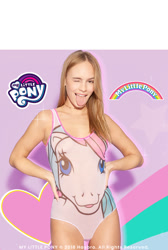 Size: 750x1113 | Tagged: safe, human, g1, clothes, irl, irl human, logo, my little pony, one eye closed, one-piece swimsuit, photo, smiling, swimsuit, tongue out, wink