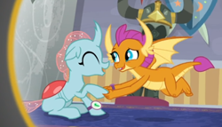 Size: 718x411 | Tagged: safe, screencap, ocellus, smolder, changedling, changeling, dragon, a matter of principals, g4, cropped, cute, diaocelles, dragoness, duo, eyes closed, female, flying, holding hands, smiling, smolderbetes, watch