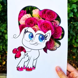 Size: 1080x1080 | Tagged: safe, pinkie pie, earth pony, pony, g4.5, my little pony: pony life, official, cute, diapinkes, flower, flower in hair, hand, instagram, irl, partial color, photo, solo, tongue out