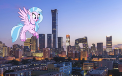 Size: 1960x1224 | Tagged: safe, edit, silverstream, hippogriff, g4, beijing, china, city, female, flying, highrise ponies, smiling, solo, spread wings, wings