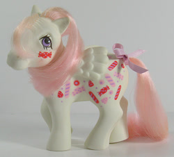 Size: 664x600 | Tagged: safe, photographer:breyer600, yum yum, g1, bow, irl, not what it looks like, photo, tail bow, toy, twice as fancy ponies