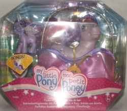 Size: 670x587 | Tagged: safe, photographer:collector1, fluttershy (g3), breezie, g3, official, french, hilarious in hindsight, irl, lady slipper, packaging, photo, spanish, toy