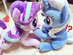 Size: 1024x768 | Tagged: safe, artist:nekokevin, starlight glimmer, trixie, pony, unicorn, series:nekokevin's glimmy, g4, duo, exclamation point, female, heart, interrobang, irl, looking at each other, mare, open mouth, photo, plushie, question mark, raised hoof, smiling