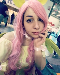 Size: 1080x1348 | Tagged: safe, fluttershy, human, g4, clothes, cosplay, costume, female, irl, irl human, photo, wings