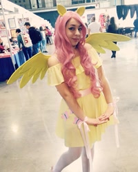 Size: 717x897 | Tagged: safe, fluttershy, human, g4, clothes, cosplay, costume, cutie mark, cutie mark on clothes, dress, female, irl, irl human, photo, wings