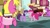 Size: 1280x720 | Tagged: safe, screencap, berry punch, berryshine, carrot top, cherry berry, coco crusoe, golden harvest, pinkie pie, twilight sparkle, alicorn, earth pony, pony, fame and misfortune, g4, background pony, bag, book, eyes closed, female, friendship journal, hoof hold, laughing, male, mare, ponyville, raised hoof, saddle bag, stallion, twilight sparkle (alicorn)