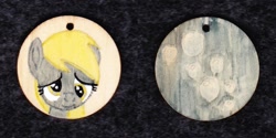 Size: 1024x513 | Tagged: safe, artist:malte279, derpy hooves, pegasus, pony, g4, craft, cutie mark, female, jewelry, pendant, traditional art, wood